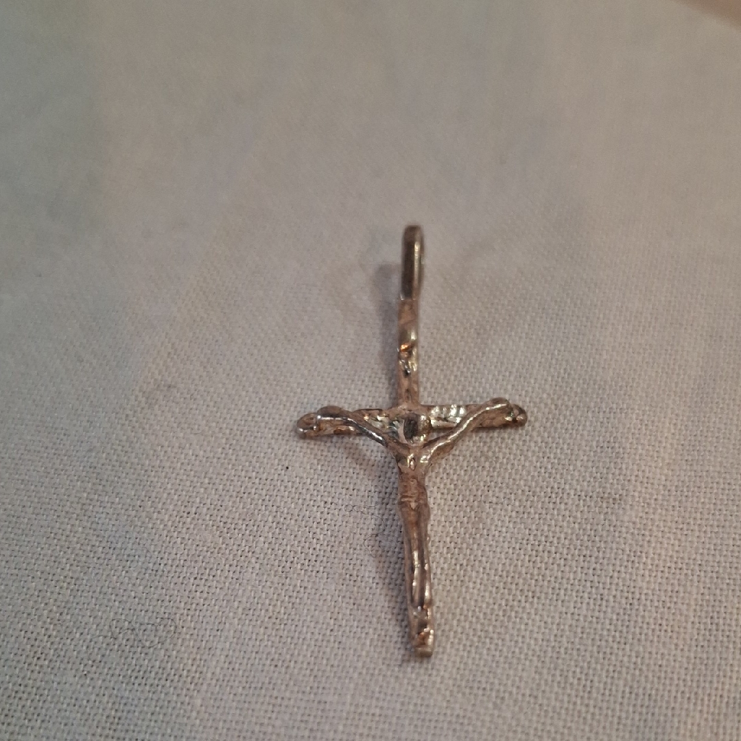 Elegant Gold Cross Pendant 70$